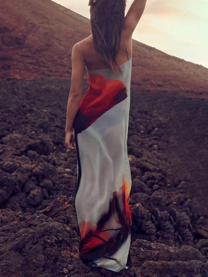 Vacation-ready women's flowing maxi dress, a chic sundress with an eye-catching abstract print.