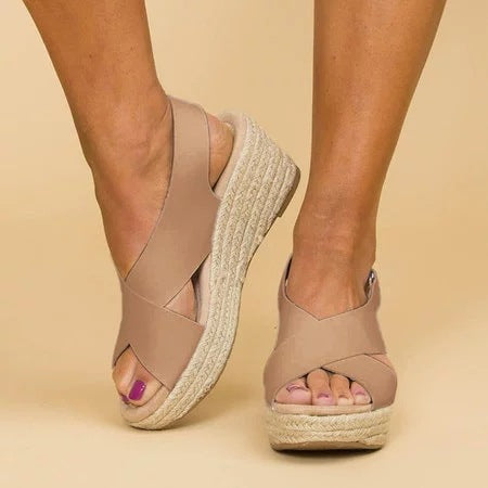Women's orthopedic wedge sandals with closed toe, offering lightweight comfort and foot support for everyday wear.