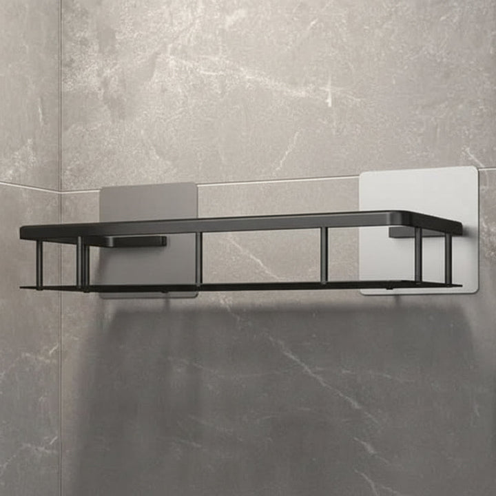 Drill-free adhesive bathroom shelf for easy wall mounting. Modern, space-saving shower caddy.