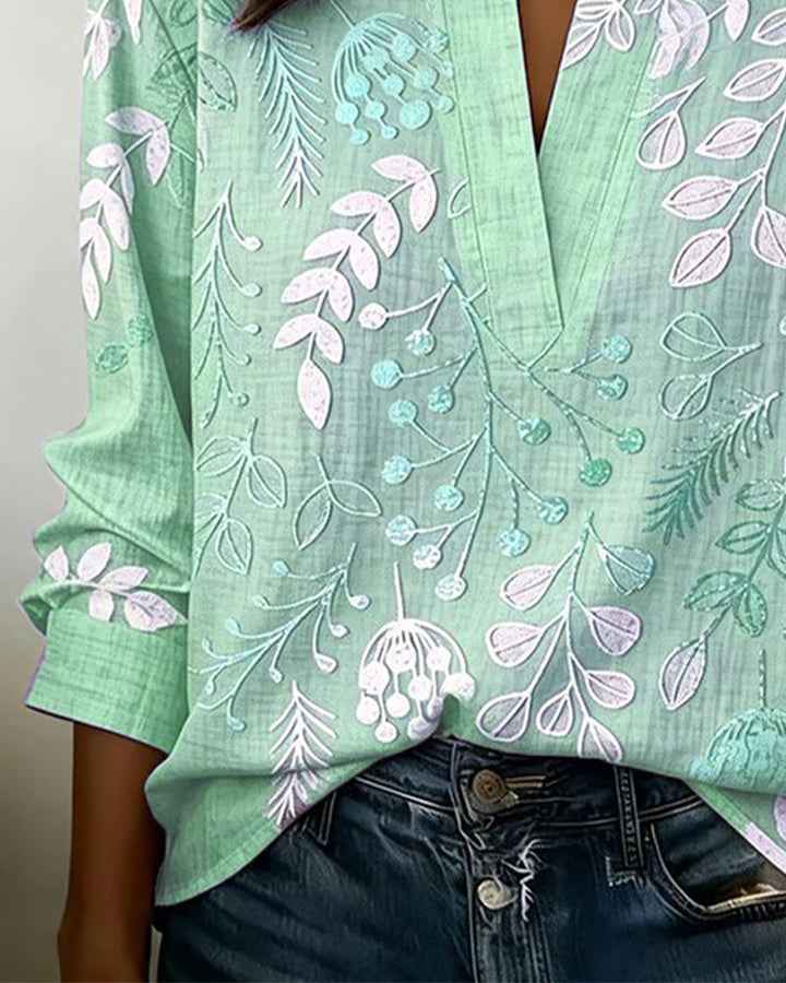 Women's apparel: Pastel Floral V-Neck Blouse, a blend of casual and refined elegance.