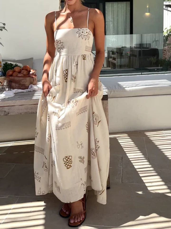 Vacation-ready women's flowy sundress, featuring a striking open back and full maxi length.
