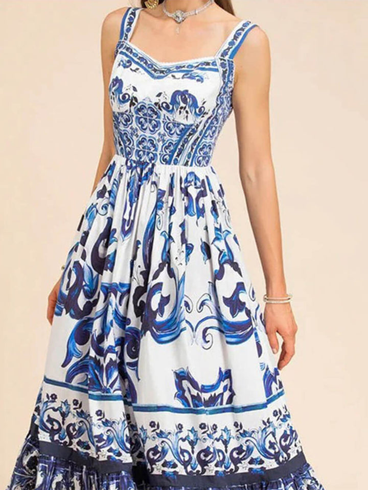 Elegant women's tiered boho midi dress, sleeveless with a square neck, perfect for summer vacations.