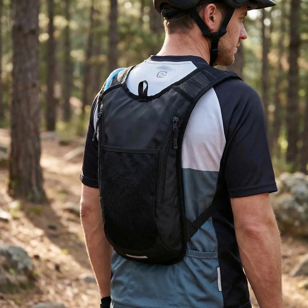 Black 10L cycling hydration backpack for trails. Unisex, lightweight, water repellent, durable design.