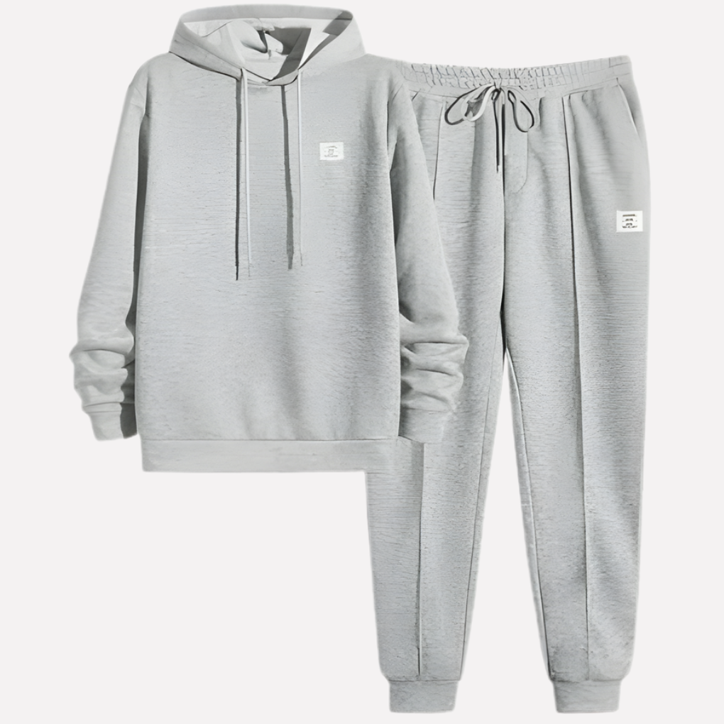 Men's modern jogger tracksuit set. Hoodie & sweatpants, a stylish two-piece for casual and athletic looks.