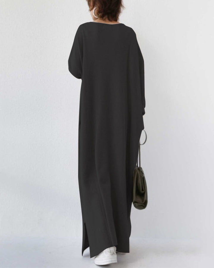 Soft, elegant women's winter maxi dress with flowing long sleeves, a cozy evening or day wear.