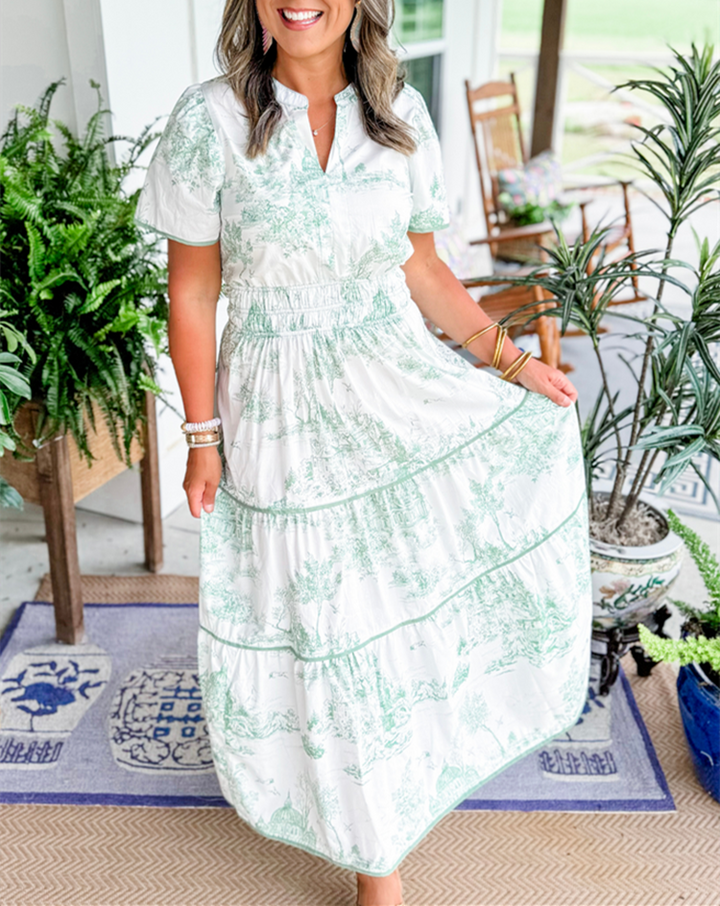 Women's V-neck maxi dress with a classic toile print. Effortlessly elegant and feminine, ideal for spring/summer.