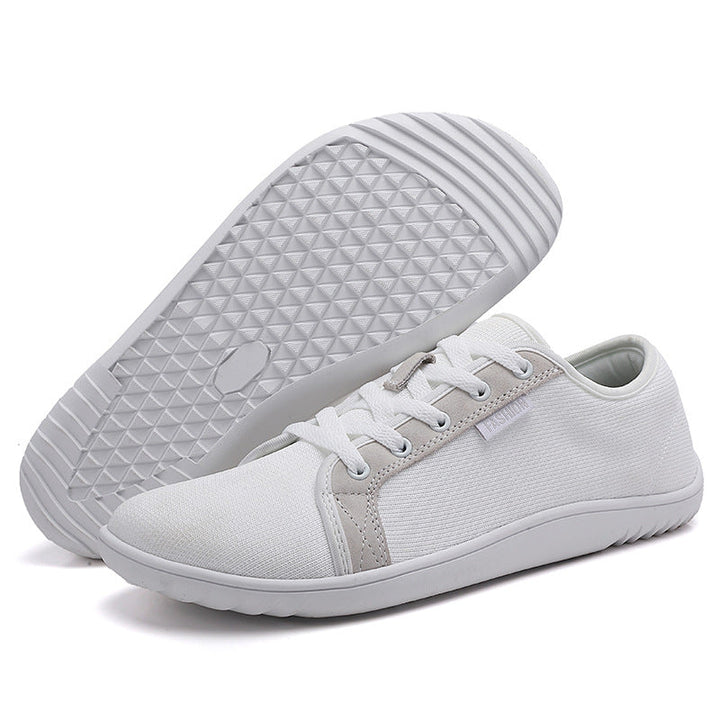 Close-up of unisex zero-drop walking shoes, highlighting wide fit for natural alignment and all-day comfort.