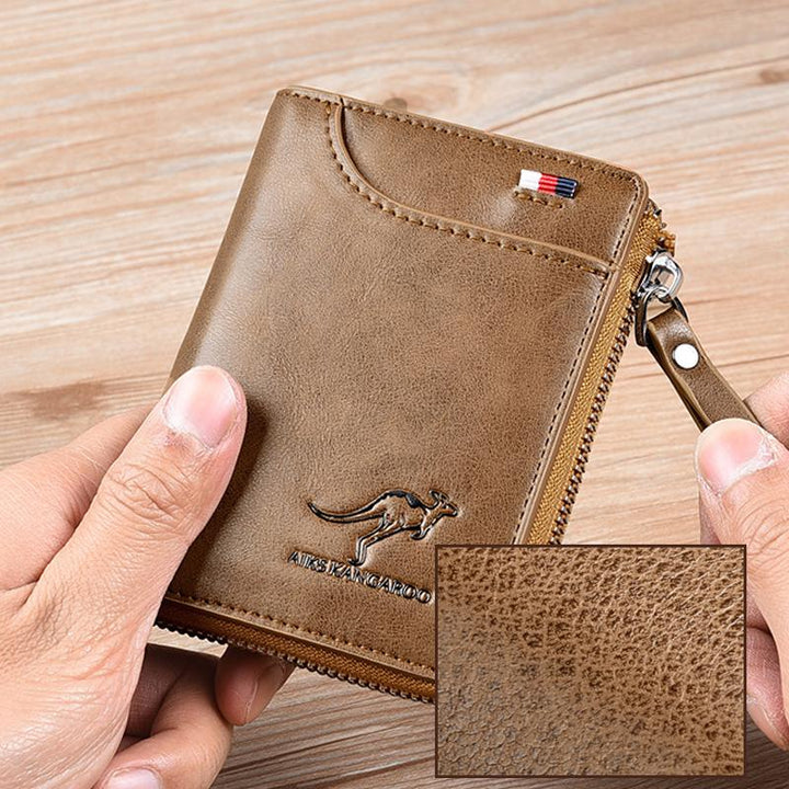 Hand holding a compact RFID blocking wallet, demonstrating its small size & ease for everyday carry.