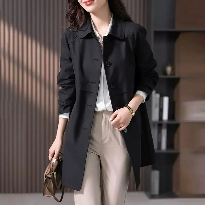 Women's tailored trench jacket, single-button design. An elegant and versatile outerwear piece for any occasion.