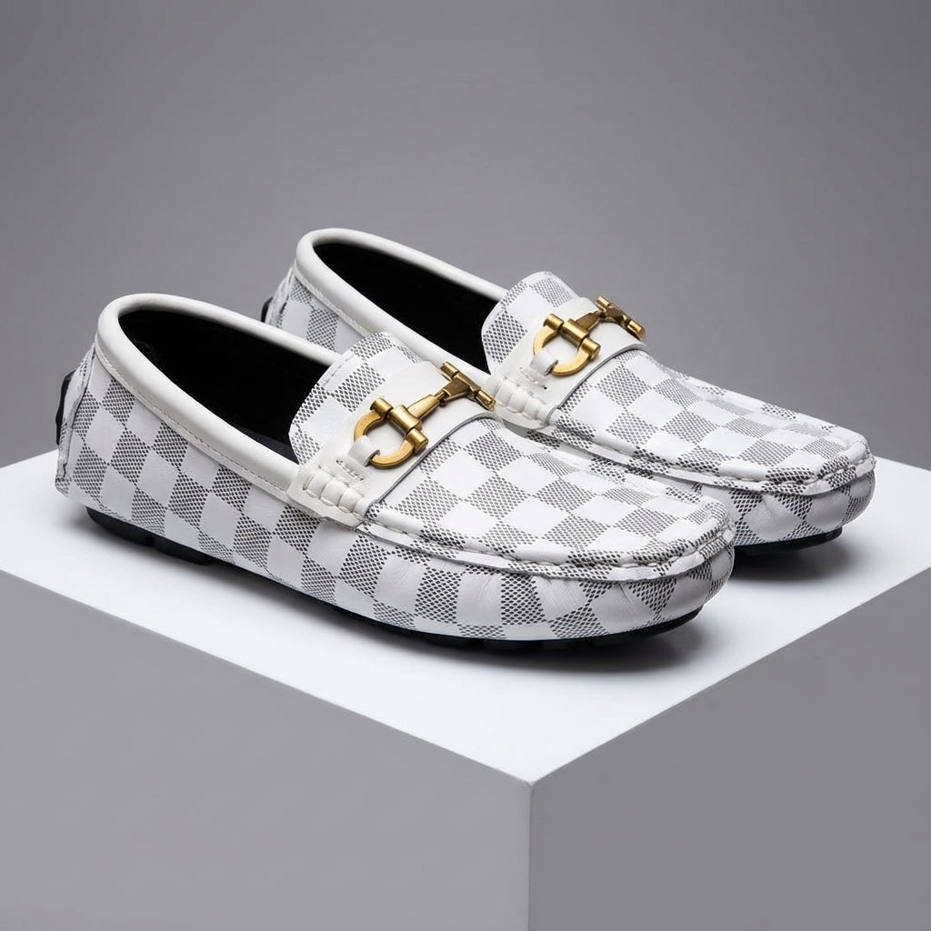 Assortment of men's slip-on loafers (black, white, brown). Stylish & comfortable casual footwear for everyday.