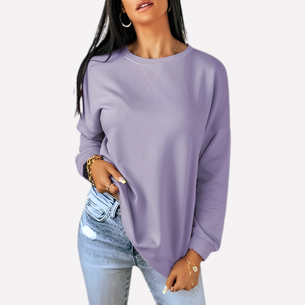 Cozy women's relaxed fit crew neck sweatshirt, an essential long sleeve for loungewear.