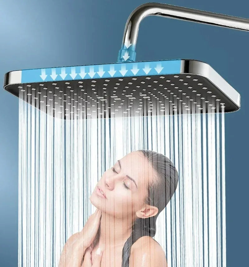 Pivoting 14-inch rain shower head with 360° rotation for adjustable coverage, ideal for a modern bathroom.