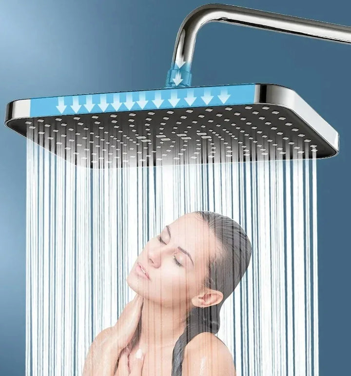 Pivoting 14-inch rain shower head with 360° rotation for adjustable coverage, ideal for a modern bathroom.