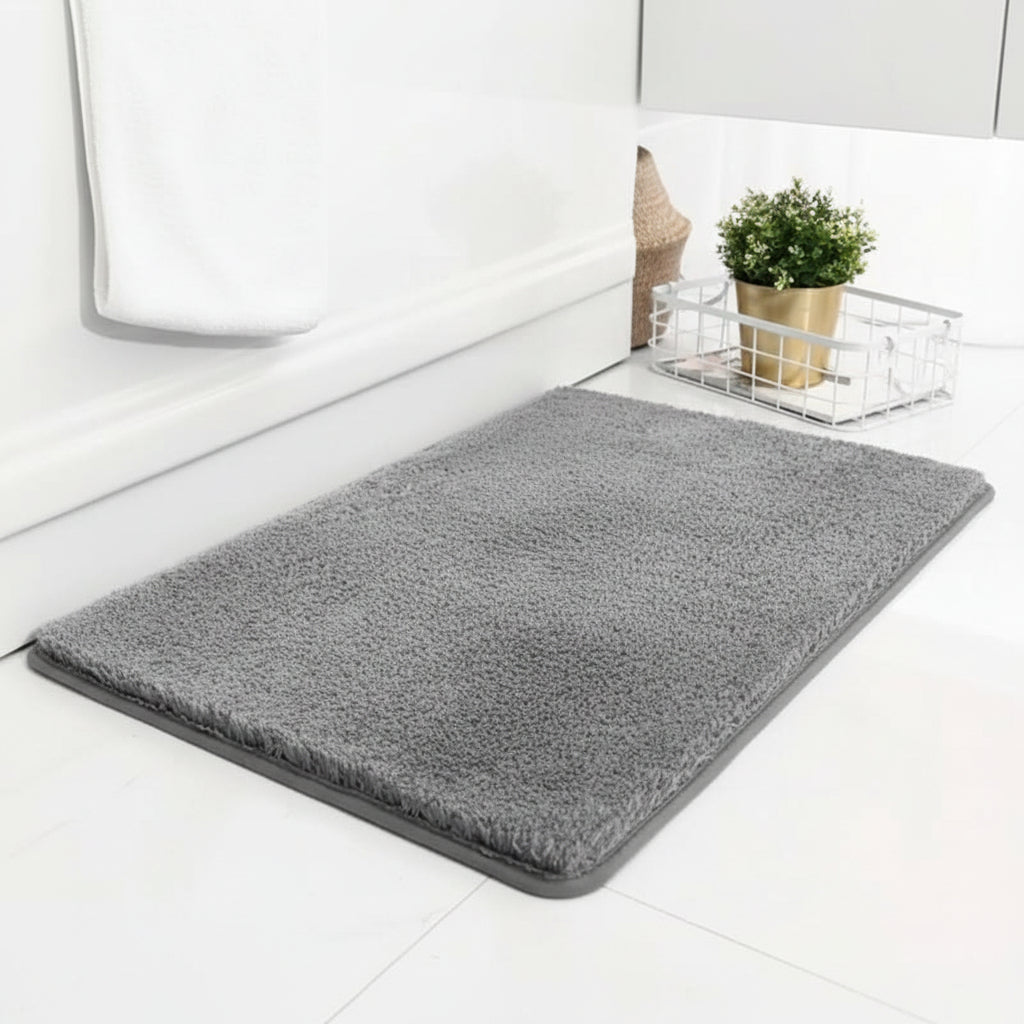 Close-up of premium ultra-soft plush bath mat texture. Highly absorbent, non-slip bathroom safety rug.