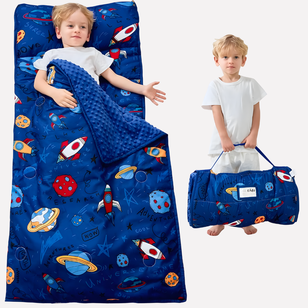 Toddler enjoying a cozy nap on a portable nap mat with its soft integrated pillow & warm blanket.
