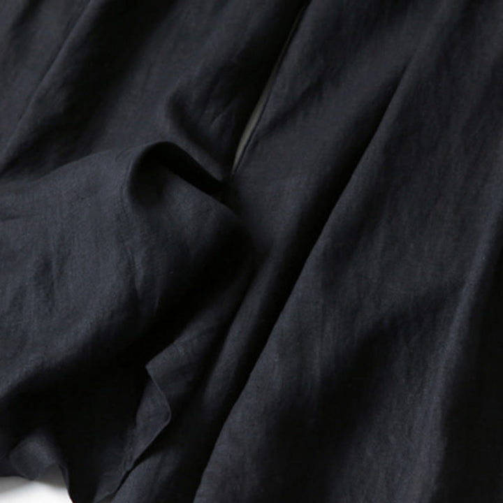 Modern high-waist wide-leg trousers for women, ideal for a chic spring/summer look.