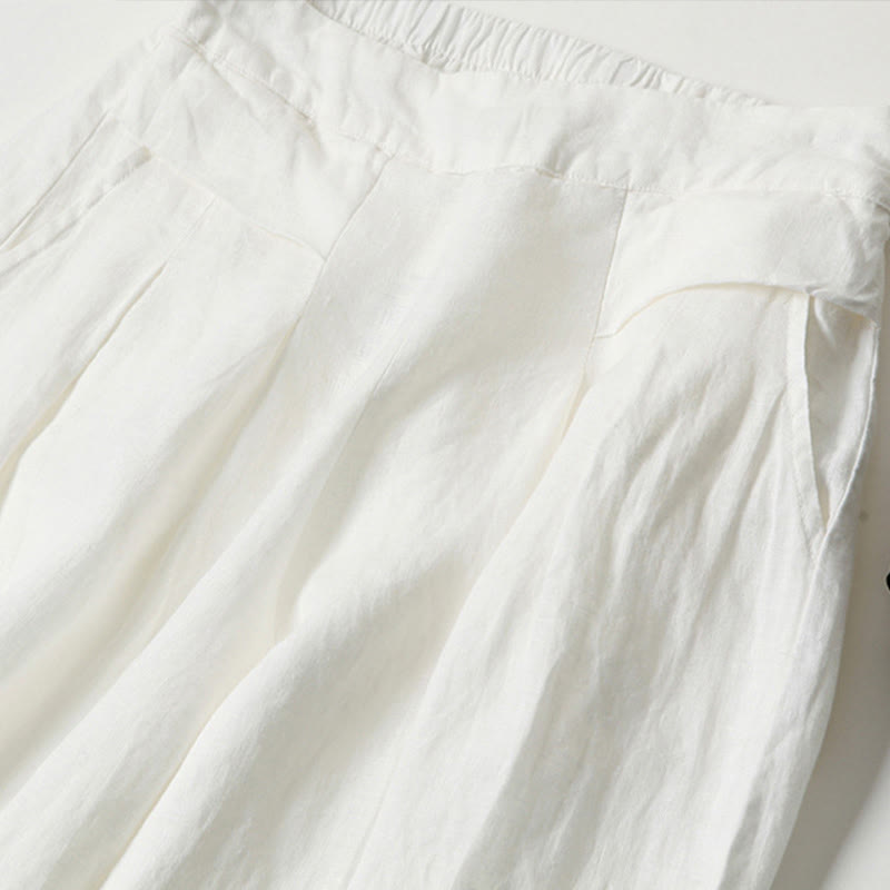 Versatile women's high-waist wide-leg trousers, perfect for smart casual occasions.