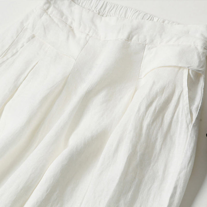 Versatile women's high-waist wide-leg trousers, perfect for smart casual occasions.