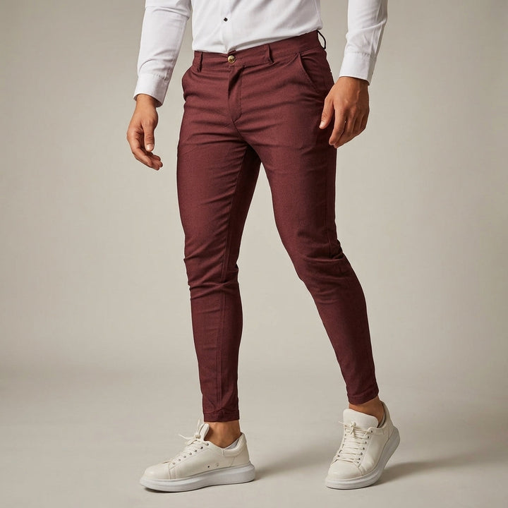 Man wearing modern slim fit business pants, demonstrating a sharp, professional silhouette and style.