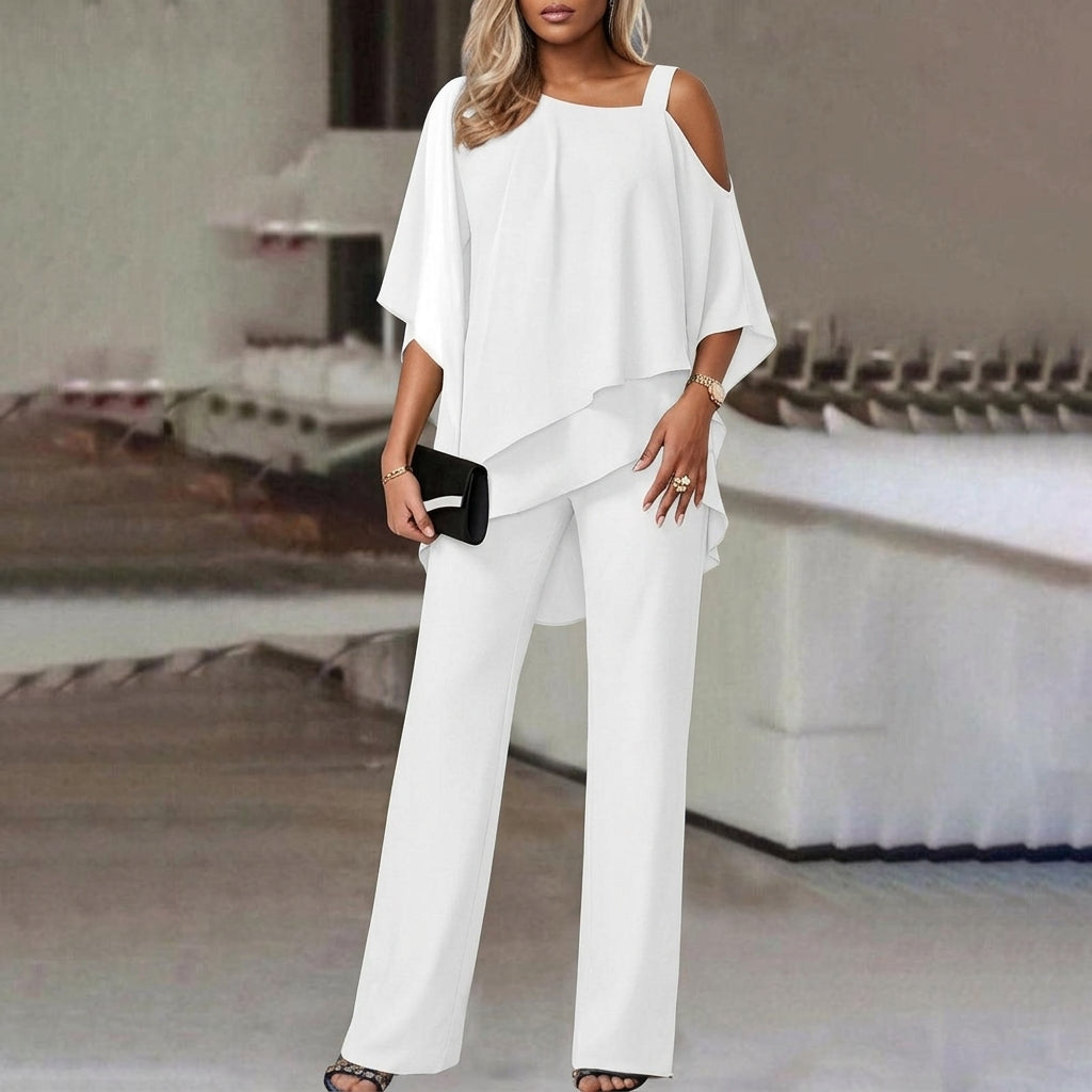 Chic women's asymmetric top and straight leg pants matching set, perfect for office or evening.