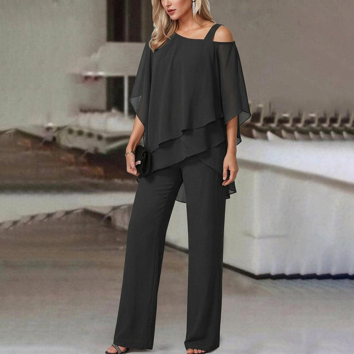 Coordinated women's fashion set featuring an elegant asymmetric top and comfortable straight leg pants.