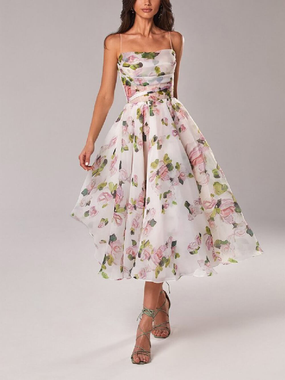 Women's boho midi dress with spaghetti straps, A-line silhouette, perfect for summer casual or vacation wear.