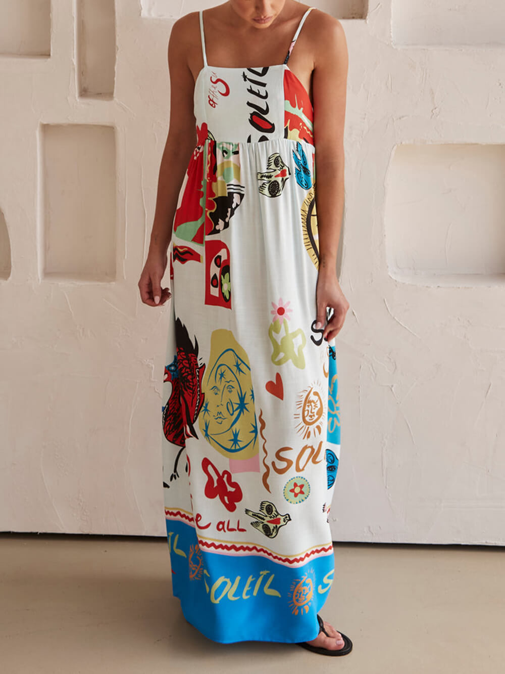 Comfortable white flowy maxi dress for women, perfect for casual summer outings and everyday wear.