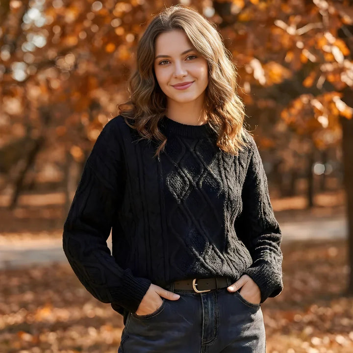 Women's vintage 90s cable knit crewneck sweater, oversized & cozy, perfect for retro fall fashion.