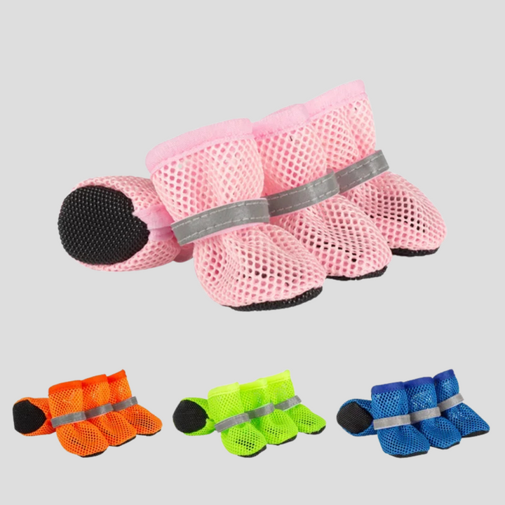 Anti-slip paw protector shoes for dogs & cats, offering safety & traction indoors/outdoors. Pet footwear.