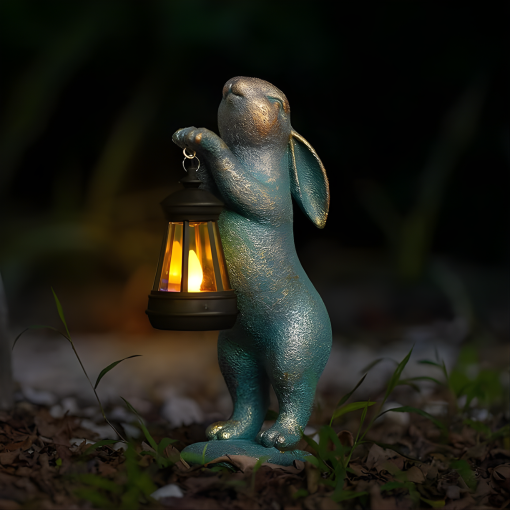 Charming bronze rabbit outdoor statue, a whimsical garden decor piece or unique garden gift.