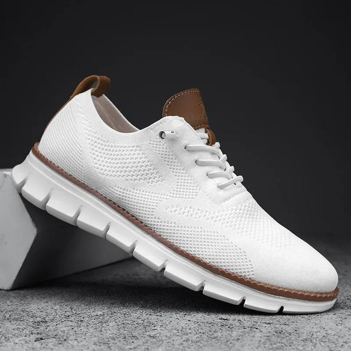 Athletic men's breathable mesh sneakers, designed for active comfort and support during sports or daily wear.