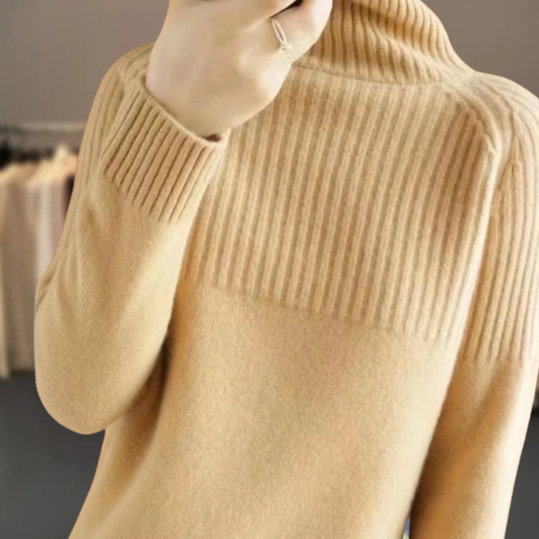 Warm women's ribbed knit turtleneck sweater. Essential long-sleeve pullover for ultimate comfort in cold weather.