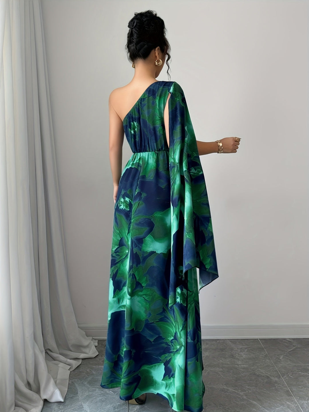 Stunning Women's One-Shoulder Floral Maxi Dress. Long, elegant design for special occasions.