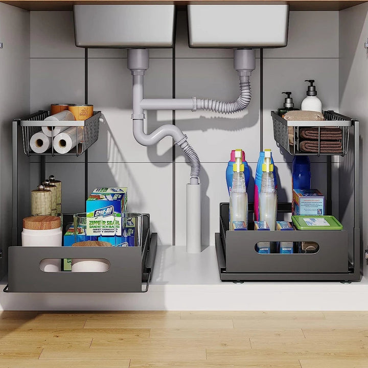 "2 tier slide out under sink organizer with L-shaped design, fits pipes, maximizes space, holds kitchen and bath essentials."