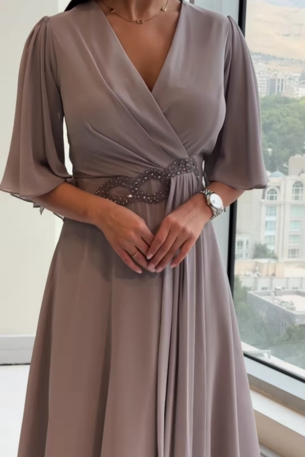 Comfortable women's flowy maxi dress featuring a V-neck and adjustable straps. Ideal for summer casual elegance.