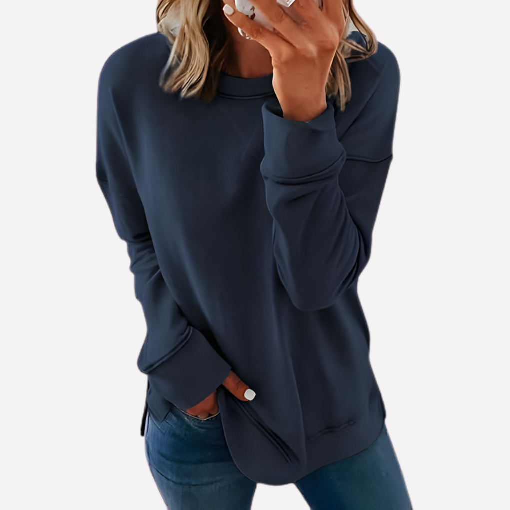 Ladies' fall fashion crew neck sweatshirt with a relaxed fit, great for versatile layering.