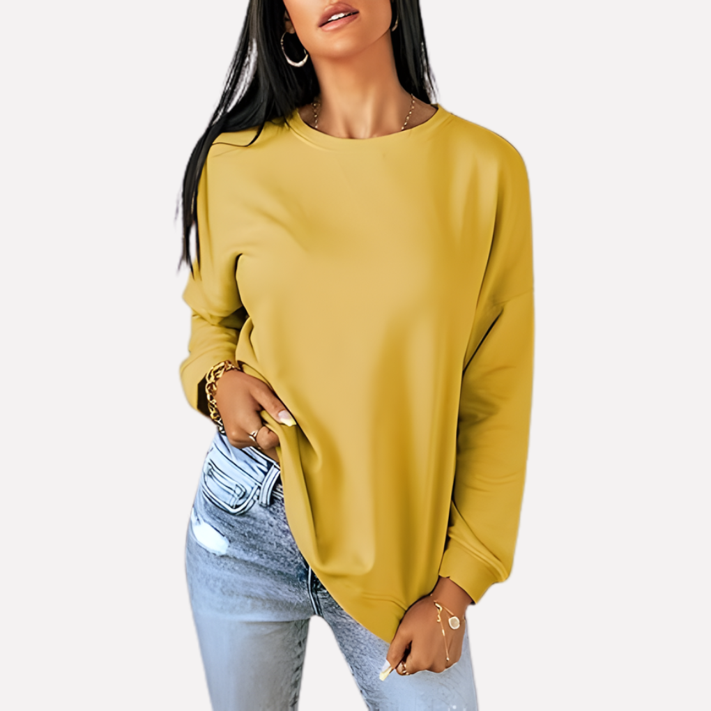 Women's relaxed fit crew neck top, a comfortable and stylish long sleeve sweatshirt.