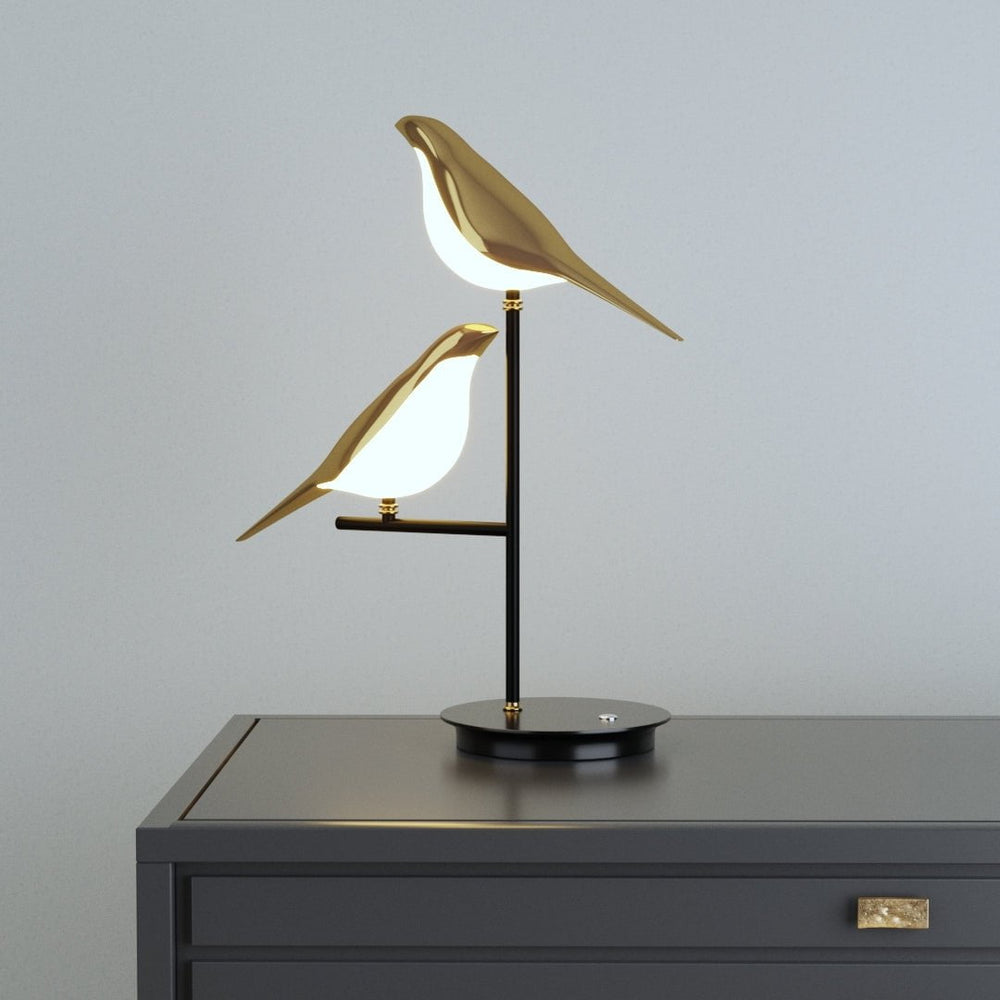 Elegant avian LED wall light with luxurious gold finish. Modern bird sconce for living rooms & bedrooms.
