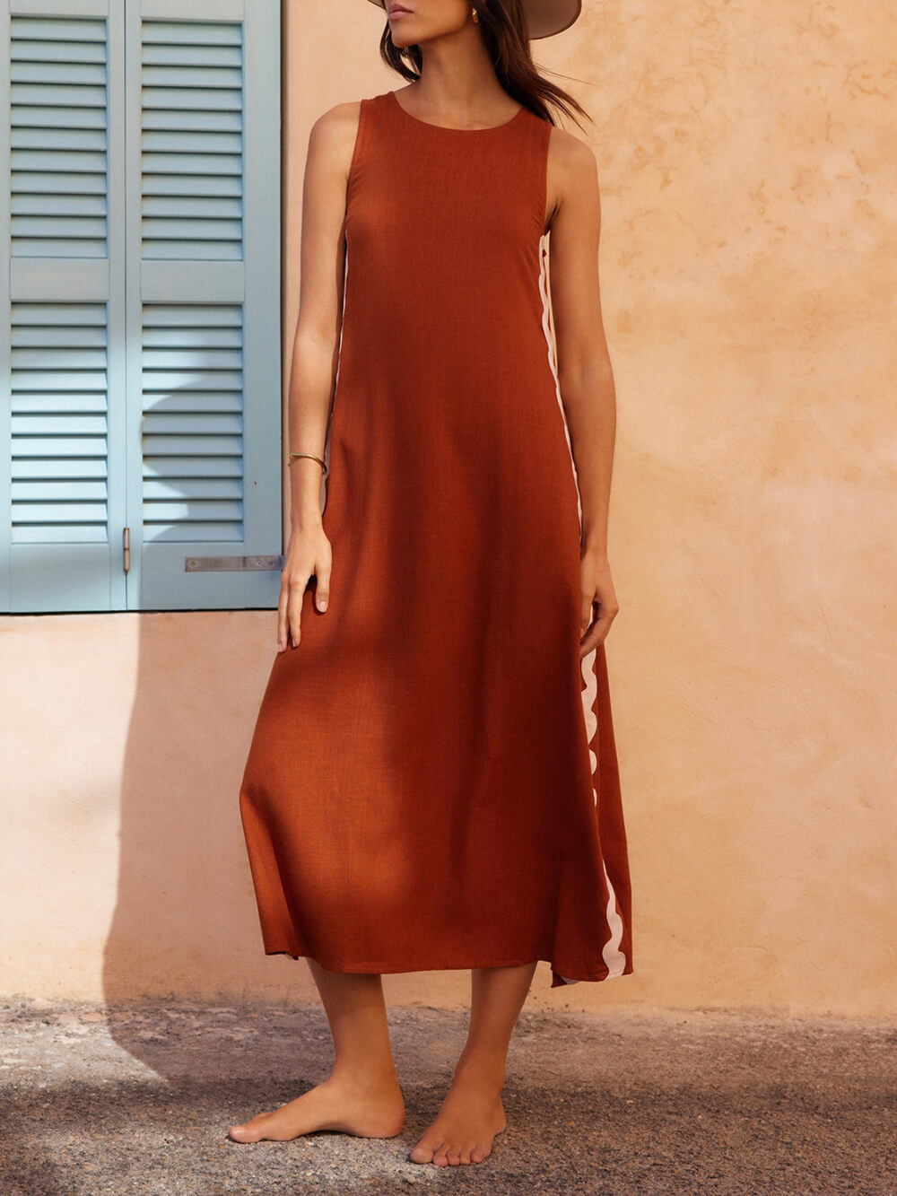 Women's elegant striped midi sundress, flowy design with side slit & pleats for summer comfort.