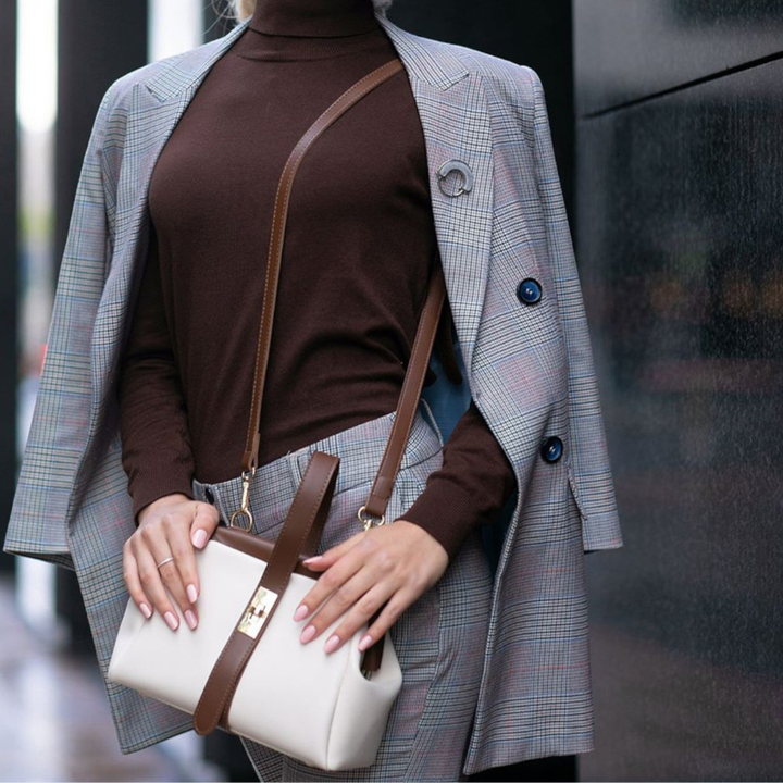 Daily women's travel crossbody bag with a comfortable adjustable strap & sturdy top handle.