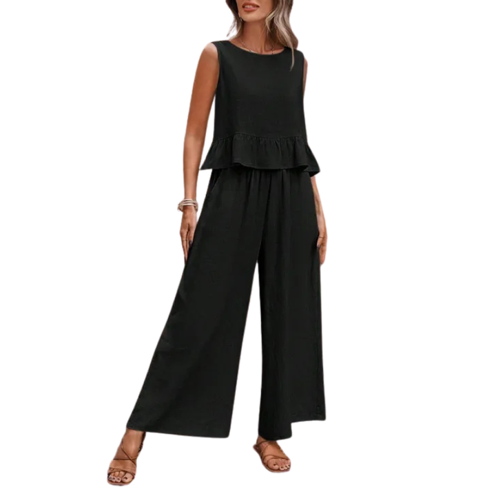 Elegant women's coordinated two-piece set featuring a ruffled tank top and flowy wide-leg pants. Versatile spring/summer fashion.