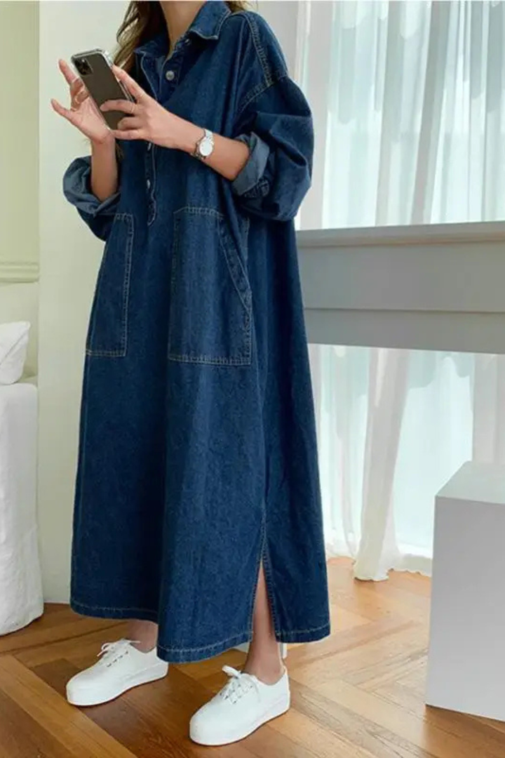 Stylish women's long oversized shirt dress, button-front design with practical pockets & a comfortable drape.