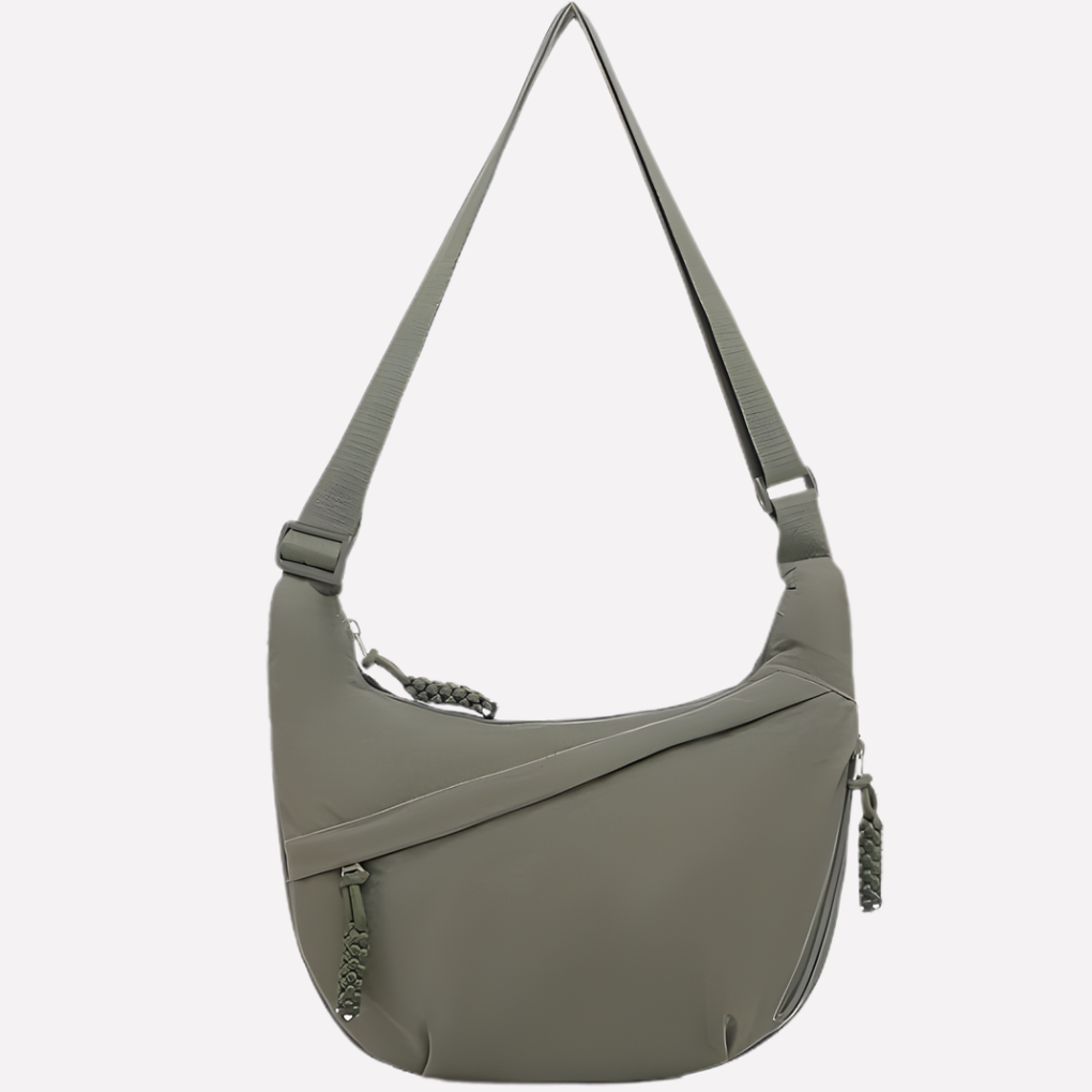 Chic women's crescent crossbody purse made of durable nylon, great for everyday outfits.