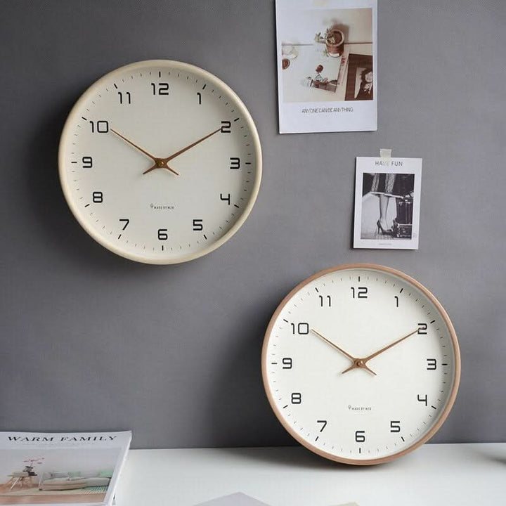 Modern Scandinavian wooden wall clock, beige, enhancing living room decor. Silent quartz for peaceful ambiance.