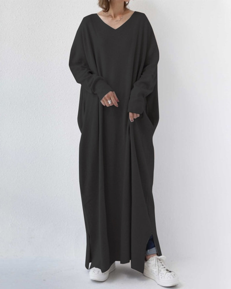 Cozy women's winter maxi dress with flowing long sleeves, ideal for comfortable seasonal fashion.