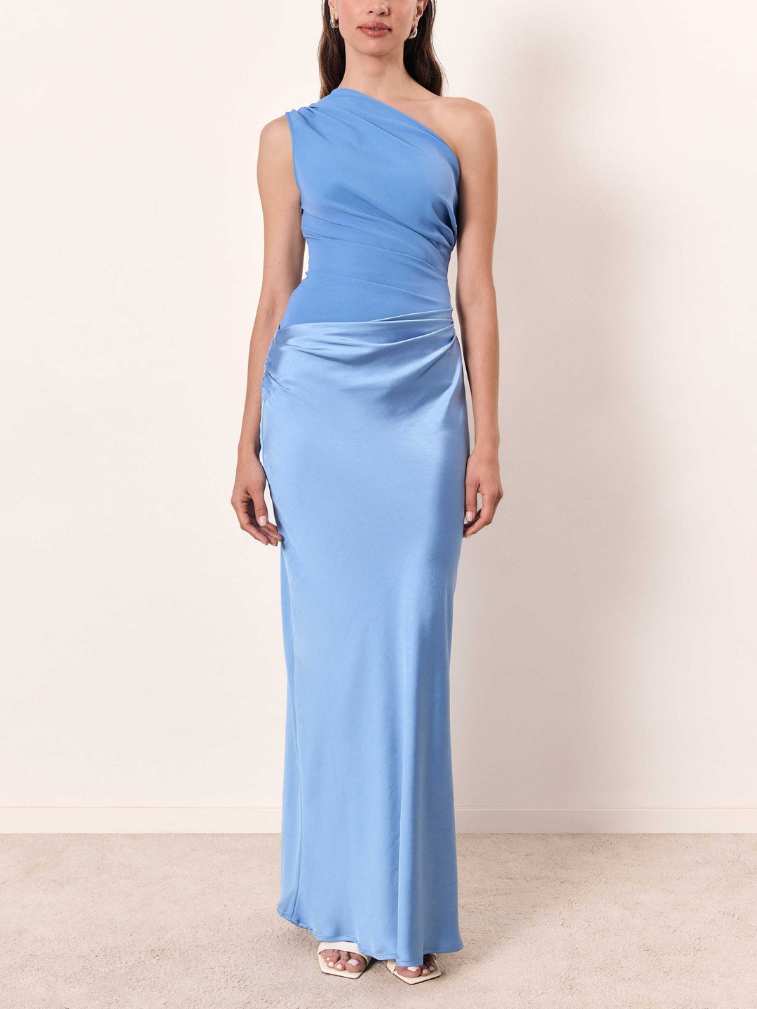 Chic brown pleated maxi dress for women, an elegant long special occasion dress with an asymmetric design.