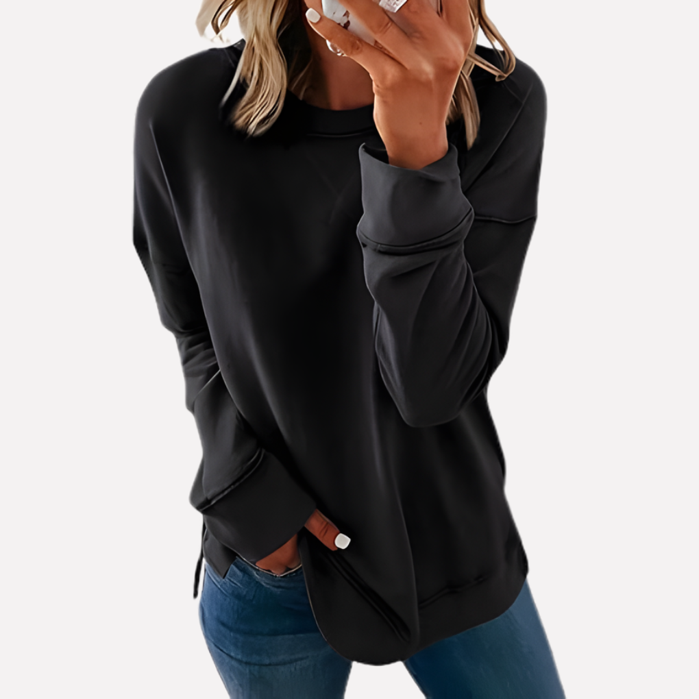 Soft women's crew neck sweatshirt, relaxed fit for comfort & casual fall/winter wear.