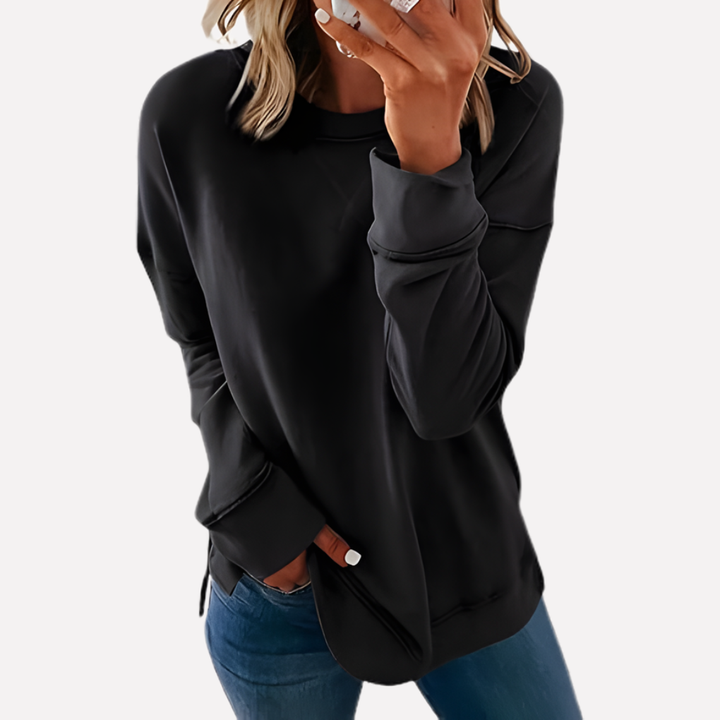 Soft women's crew neck sweatshirt, relaxed fit for comfort & casual fall/winter wear.
