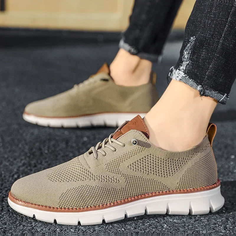 Men's breathable mesh sneakers with lace-up design for active comfort, lightweight summer footwear.