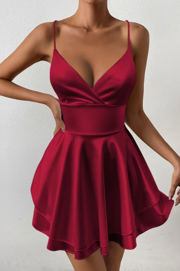 Stunning women's open back swing dress with an elegant pleated design. Great for parties, weddings, & evening events.